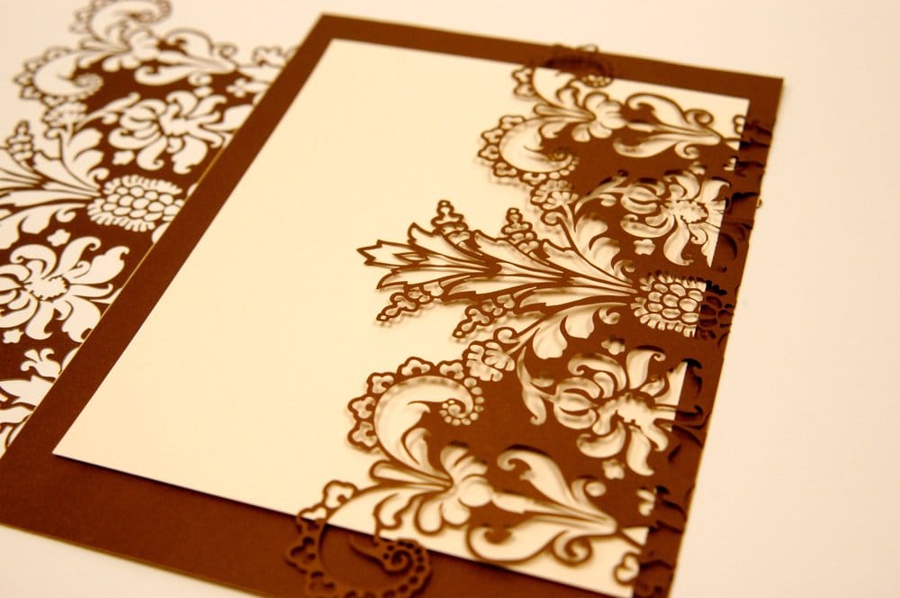 Intricate laser cut card with complex lace pattern. Processed by LasX