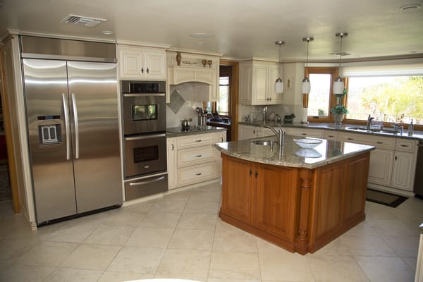Custom glazed cabinetry, Seafoam Green Granite, Tile flooring and Custom glazed cabinetry, Seafoam Green Granite, Tile flooring and
