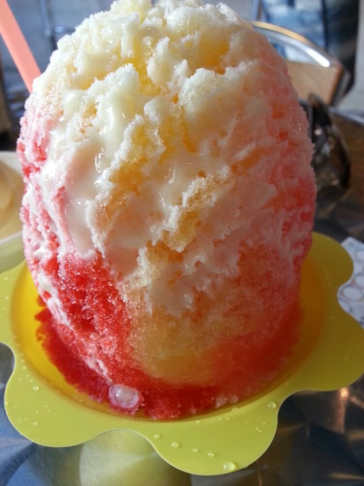 Shaved ice vanilla ice cream, condensed milk, tigers blood syrup, cotton candy syrup